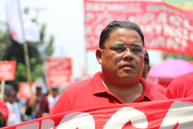 Anakpawis Partylist Representative Ayik Casilao joins the struggle of workers for a higher minimum wage.